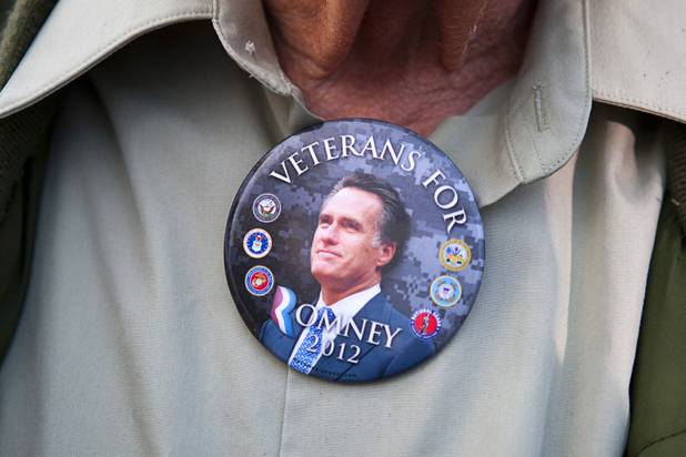 A supporter wears a campaign button as he waits for Republican vice presidential candidate Paul Ryan during a campaign stop in Las Vegas Thursday Nov. 1, 2012.
