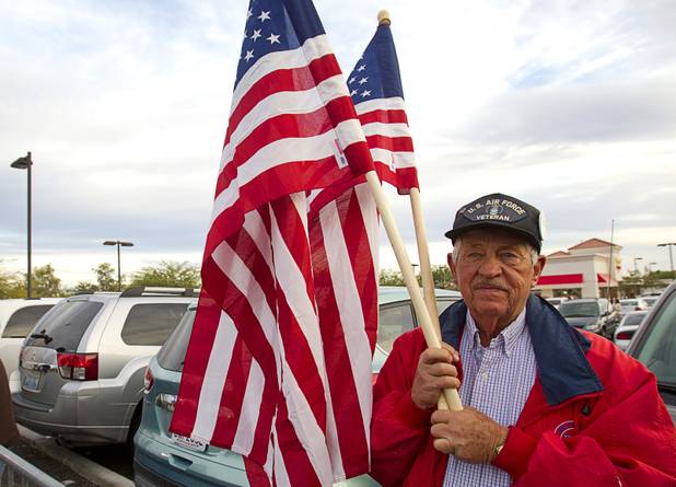 Ernie Griffes of San Diego waits for Republican vice presidential candidate Paul Ryan during a campaign stop in Las Vegas Thursday Nov. 1, 2012.