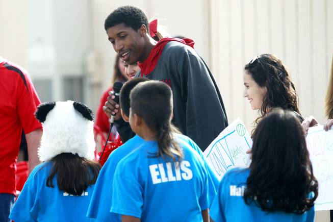 Justin Hawkins talks to students while appearing at an event at Cunningham Elementary School Nov. 1, 2012.