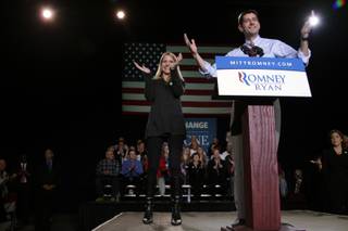 Republican vice presidential candidate, Rep. Paul Ryan, R-Wis., appears on stage with his wife Janna during a campaign event, Thursday, Nov. 1, 2012, in Reno, Nev. 