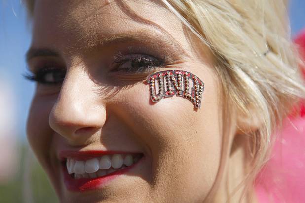 UNLV cheerleader Tayler Krumme waits for the start of UNLV's game against New Mexico at Sam Boyd Stadium on Saturday, Nov. 3, 2012. 
