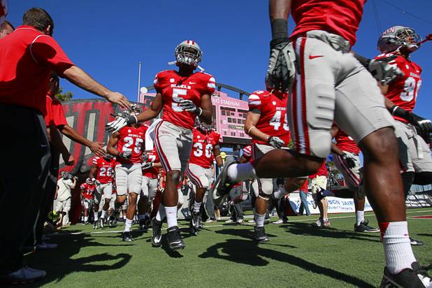 The UNLV Rebels take the field for their game against New Mexico at Sam Boyd Stadium on Saturday, Nov. 3, 2012.