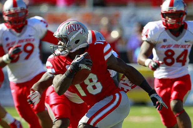 UNLV's Marcus Sullivan carries the ball during a punt return during UNLV's game against New Mexico at Sam Boyd Stadium Saturday, Nov. 3, 2012.