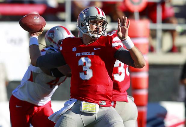 UNLV quarterback Nick Sherry passes against New Mexico at Sam Boyd Stadium Saturday, Nov. 3, 2012.