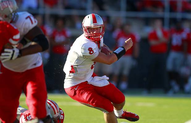 New Mexico quarterback Cole Gautsche carries the ball against UNLV at Sam Boyd Stadium Saturday, Nov. 3, 2012.