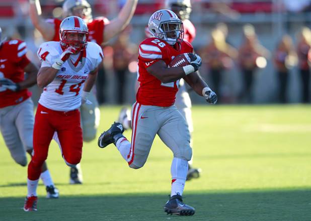UNLV's Bradley Randle outruns a host of New Mexico defenders for a touchdown at Sam Boyd Stadium Saturday, Nov. 3, 2012.
