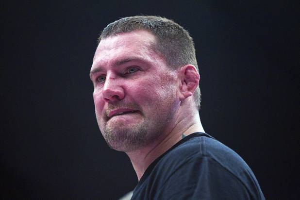 Heavyweight Devin Cole of Medford, Ore. stands in the ring after his first round TKO loss to Andrei Arlovski of Belarus during the World Series of Fighting debut at the PH Live theater at Planet Hollywood Saturday, Nov. 3, 2012. The event was broadcast live on the NBC Sports Network.