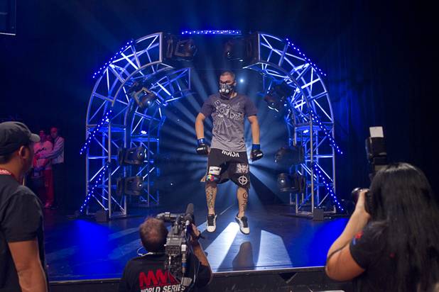DJ Linderman of Yreka, Calif. makes his entrance during the World Series of Fighting debut in the PH Live theater at Planet Hollywood Saturday, Nov. 3, 2012. The event was broadcast live on the NBC Sports Network.