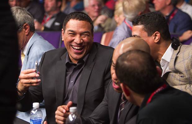 World Series of Fighting president Ray Sefo shows a video   on his phone to friends during the World Series of Fighting debut in the PH Live theater at Planet Hollywood Saturday, Nov. 3, 2012. The event was broadcast live on the NBC Sports Network.