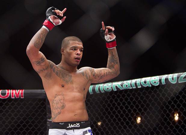 Tyrone Spong of Juper, Fla. celebrates his win over Travis Bartlett of Maine during the World Series of Fighting debut in the PH Live theater at Planet Hollywood Saturday, Nov. 3, 2012. The event was broadcast live on the NBC Sports Network.