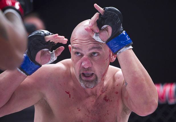 Travis Bartlett of Maine bleeds from a cut on the side of his head in a fight against Tyrone Spong of Jupiter, Fla. during the World Series of Fighting debut in the PH Live theater at Planet Hollywood Saturday, Nov. 3, 2012. The event was broadcast live on the NBC Sports Network.