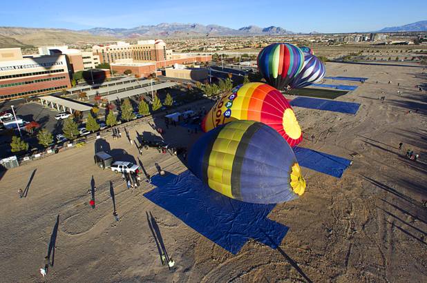 Hot air balloons prepare to take off during the Friends of Metro Search and Rescue Las Vegas Balloon Festival and carnival at the Southern Hills Hospital campus on West Sunset Road Sunday, Nov. 4, 2012.  Festival proceeds from the balloon rides will benefit the nonprofit organization that helps support members of the Las Vegas Police Department Metro Search and Rescue section, many of whom are volunteers.
