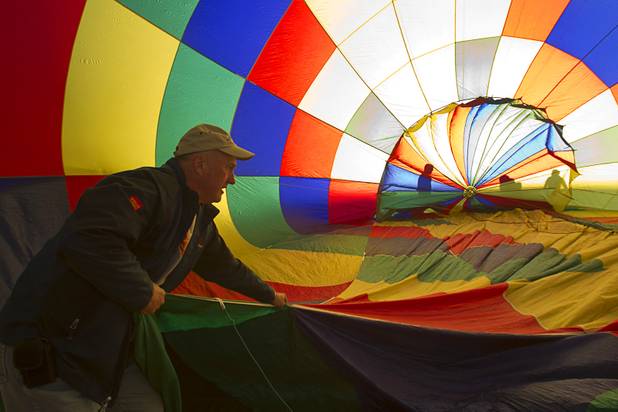 Pilot Bill Woodhead of HIS SKY Ministries set up his hot air balloon during the Friends of Metro Search and Rescue Las Vegas Balloon Festival and carnival at the Southern Hills Hospital campus on West Sunset Road Sunday, Nov. 4, 2012.  Festival proceeds from the balloon rides will benefit the nonprofit organization that helps support members of the Las Vegas Police Department Metro Search and Rescue section, many of whom are volunteers.