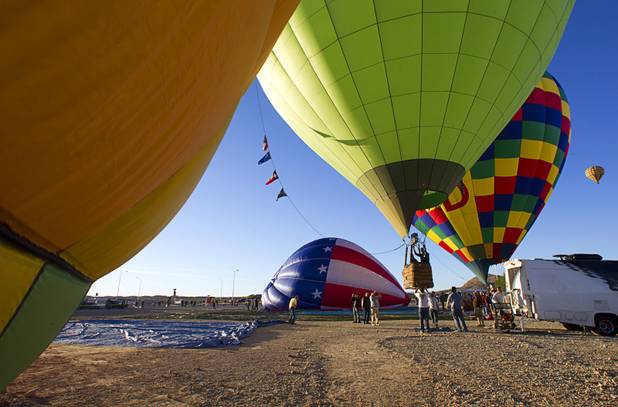 Hot air balloons take off during the Friends of Metro Search and Rescue Las Vegas Balloon Festival and carnival at the Southern Hills Hospital campus on West Sunset Road Sunday, Nov. 4, 2012.  Festival proceeds from the balloon rides will benefit the nonprofit organization that helps support members of the Las Vegas Police Department Metro Search and Rescue section, many of whom are volunteers.