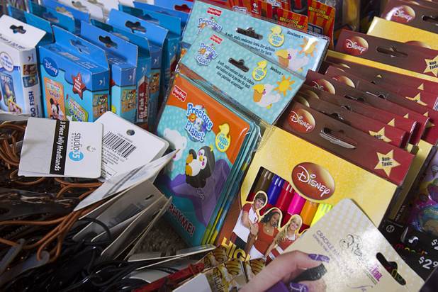 Toys are displayed at Susan England's home Sunday, Nov. 4, 2012. England made a New Year's resolution to collect 100 toys for $100 to donate to the Toys For Tots charity. Then, after she reached the goal, she just kept on going she said.