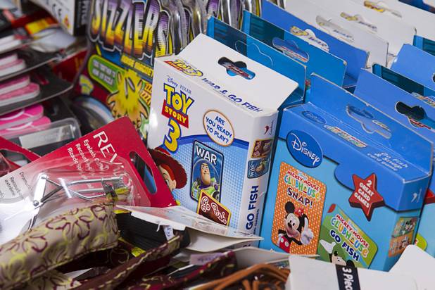 Toys are displayed at Susan England's home Sunday, Nov. 4, 2012. England made a New Year's resolution to collect 100 toys for $100 to donate to the Toys For Tots charity. Then, after she reached the goal, she just kept on going she said.
