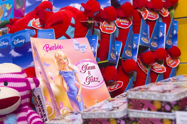Toys are displayed at Susan England's home Sunday, Nov. 4, 2012. England made a New Year's resolution to collect 100 toys for $100 to donate to the Toys For Tots charity. Then, after she reached the goal, she just kept on going she said.