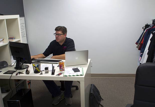 Tommy Bell, founder of SalonShare.com, works at his office Monday, Nov. 5, 2012. Bell says says it can be quite hard for companies to get startup financing, largely because there is a small number of local tech investors.