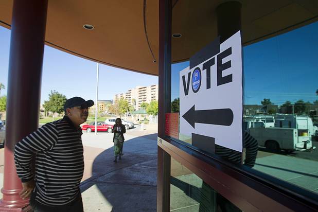 Voters head to a polling place at the Cambridge Recreation Center on Election Day, Tuesday, Nov. 6, 2012.