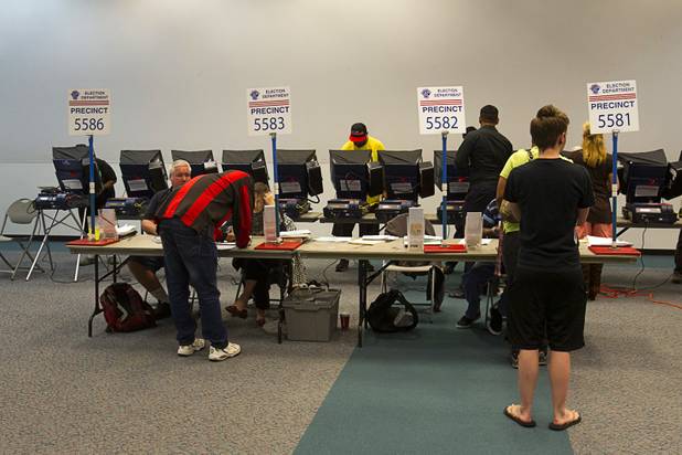 Voters cast their ballots on Election Day on Tuesday, Nov. 6, 2012, at Cambridge Recreation Center.