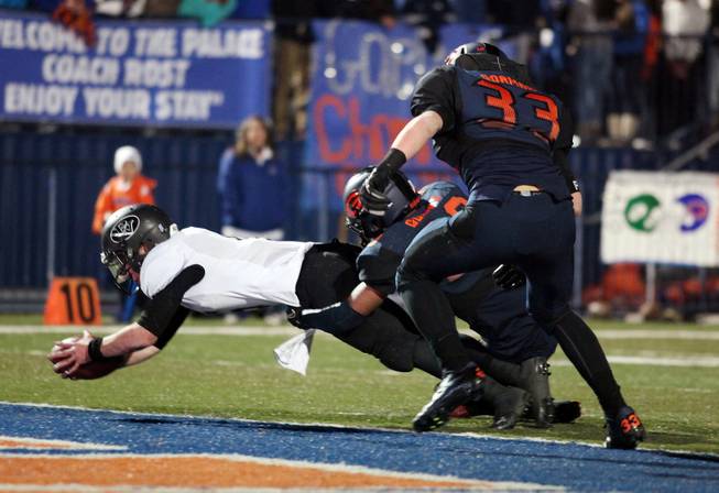 Palo Verde quarterback Parker Rost makes a dive into the end zone during the Sunset Regional semifinals at Bishop Gorman High School in Las Vegas on Friday, November 9, 2012.