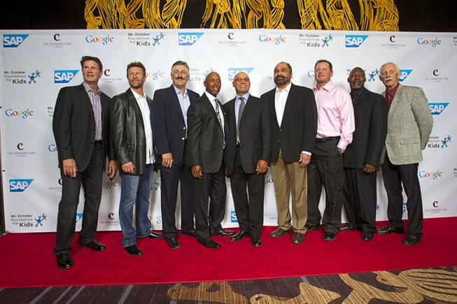 Reggie Jackson, center, poses with guests during his 8th All-Star Celebrity Classic at the Cosmopolitan Sunday, Nov. 11, 2012. From left: Jim Palmer, Robin Yount, Rollie Fingers,  Jeffrey Osborne, Franco Harris, Roger Clemens, Dave Stewart and Joe Rudi. The event raised funds for the Mr. October Foundation for Kids, a charity that supports minority students pursuing education in science and technology.