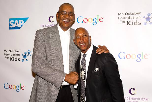 Former NBA player Gerge Gervin and R&B singer Jeffrey Osborne pose during Reggie Jackson's 8th All-Star Celebrity Classic at the Cosmopolitan Sunday, Nov. 11, 2012. The event raised funds for the Mr. October Foundation for Kids, a charity that supports minority students pursuing education in science and technology.