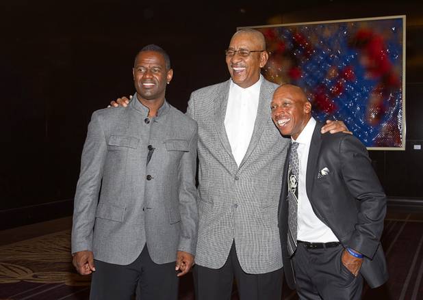 Former NBA player George Gervin poses with singers Brian McKnight, left, and  Jeffrey Osborne during Reggie Jackson's 8th All-Star Celebrity Classic at the Cosmopolitan Sunday, Nov. 11, 2012. The event raised funds for the Mr. October Foundation for Kids, a charity that supports minority students pursuing education in science and technology.