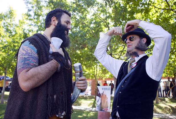 Rien Long, left of Nashville, Tenn. chats with Shanti Beeman of San Diego during the third annual 2012 Beard Team USA National Beard and Moustache Championships at the Clark County Government Center amphitheater in downtown Las Vegas Sunday, November 11, 2012.