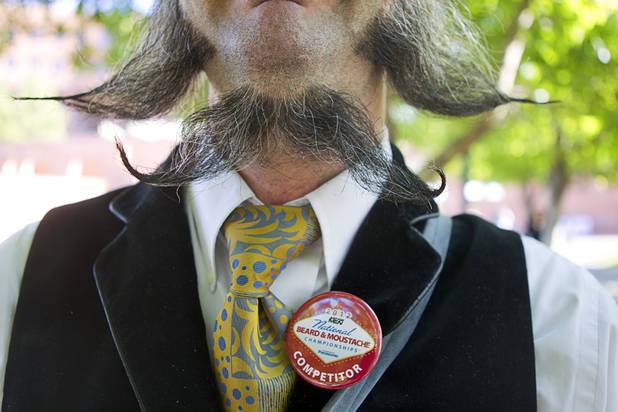 Shanti Beeman of San Diego poses during the third annual 2012 Beard Team USA National Beard and Moustache Championships at the Clark County Government Center amphitheater in downtown Las Vegas Sunday, November 11, 2012. Beeman was competing in the free-style partial beard category.