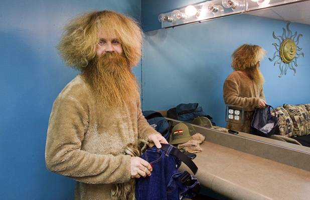 Bob Engle of Portland, Ore. prepares for third annual 2012 Beard Team USA National Beard and Moustache Championships at the Clark County Government Center amphitheater in downtown Las Vegas Sunday, November 11, 2012. Engle, dressed in a lion costume, was competing in the full natural beard category.