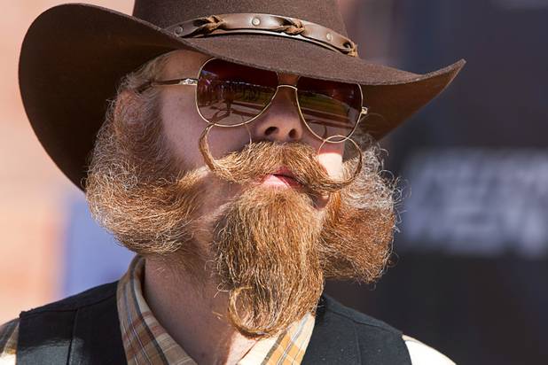 Aaron Holley of Fresno, Calif. is shown during competitor introductions in the third annual 2012 Beard Team USA National Beard and Moustache Championships at the Clark County Government Center amphitheater in downtown Las Vegas Sunday, November 11, 2012.