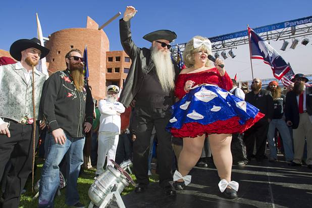 Hostess "Big Judy" sings during the third annual 2012 Beard Team USA National Beard and Moustache Championships at the Clark County Government Center amphitheater in downtown Las Vegas Sunday, November 11, 2012.