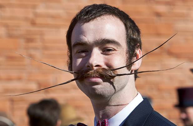 Devon Holcombe of Jacksonville, Fla. prepares to compete in the third annual 2012 Beard Team USA National Beard and Moustache Championships at the Clark County Government Center amphitheater in downtown Las Vegas Sunday, November 11, 2012.