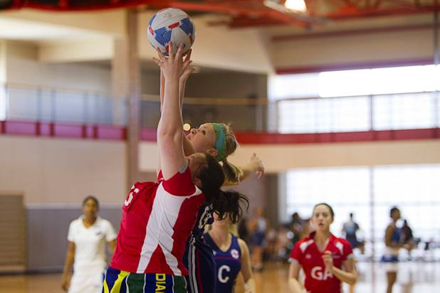 Players jump for a ball during the 2012 CallidusCloud U.S. Open Netball Championships at UNLV campus Sunday, November 11, 2012.