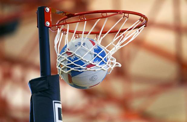 A basket is made during the 2012 CallidusCloud U.S. Open Netball Championships at UNLV campus Sunday, November 11, 2012. The ball and the hoop are slightly smaller than in regular basketball and there is no backboard.