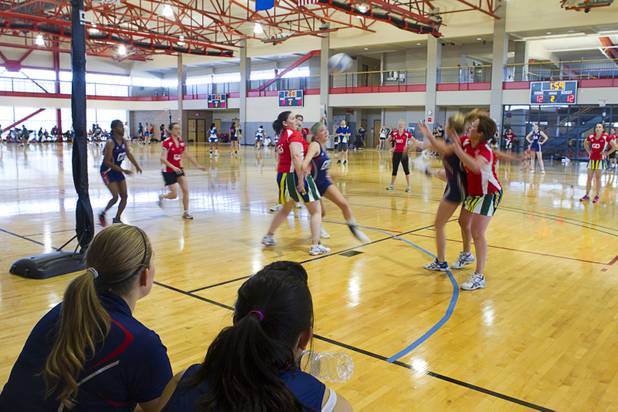 Jordan Keen, left, and Shallyn Reeves of Team USA watch as their team takes on the the Las Vegas Devils during the 2012 CallidusCloud U.S. Open Netball Championships at UNLV campus Sunday, November 11, 2012.