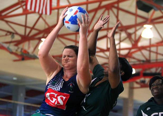 Juanita Hill of Brothers Netball Club of Australia catches a pass in the women's finals match a giant the Southeast Strikers during the 2012 CallidusCloud U.S. Open Netball Championships at UNLV campus Sunday, November 11, 2012.