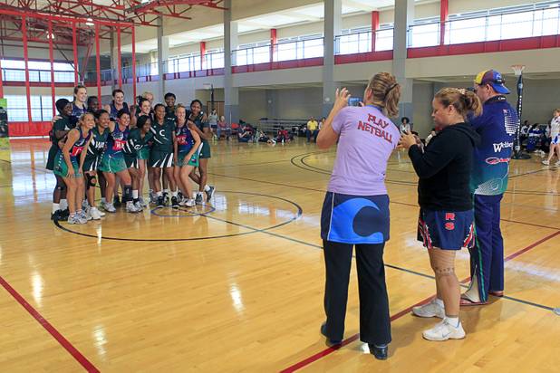 Members of Southeast Strikers and Brothers Netball Club of Australia pose for a photo after the women's finals match during the 2012 CallidusCloud U.S. Open Netball Championships at UNLV campus Sunday, November 11, 2012. Brothers Netball Club of Australia won the women's final.
