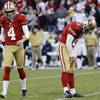 San Francisco 49ers kicker David Akers, right, reacts with holder Andy Lee after missing a 33-yard field goal during overtime of an NFL football game against the St. Louis Rams in San Francisco on Sunday, Nov. 11, 2012.