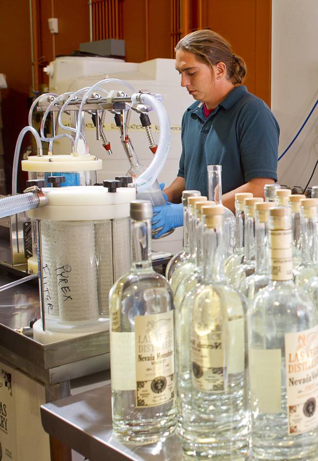 Stillman Sid Kindler fills a bottle at the Las Vegas Distillery in Henderson Monday, Nov. 12, 2012. The distillery, at 7330 Eastgate Road, will celebrate the historic bottling of several new spirits -Nevada whiskey, rum, gin and moonshine- on Saturday, Nov. 17. The company is already producing Nevada Vodka and Rumskey.