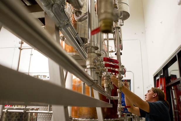 Sid Kindler flushes out the still after a run at the Las Vegas Distillery in Henderson Monday, Nov. 12, 2012. The distillery, 7330 Eastgate Road, will celebrate the historic bottling of several new spirits -Nevada whiskey, rum, gin and moonshine- on Saturday, Nov. 17. The company is already producing Nevada Vodka and Rumskey.
