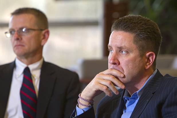 Doug Geinzer, right, CEO of the Southern Nevada Medical Industry Coalition, listens during an economic roundtable discussion at the Las Vegas Sun Wednesday, November 14, 2012.