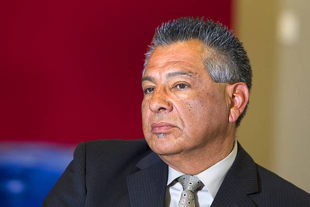 Joe Hernandez, president/COO of Branch-Hernandez & Associates Insurance Services, listens during an economic roundtable discussion at the Las Vegas Sun Wednesday, November 14, 2012.