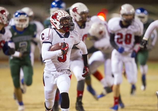 Coronado's Brock Taeubel breaks away for a 78-yard touchdown run against Green Valley in the first quarter of the Sunrise regional semifinal at Green Valley High School in Henderson Friday, November 16 , 2012.