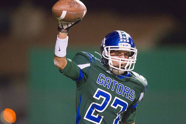 Green Valley's Markus Varner celebrates after scoring Green Valley's first touchdown during the Sunrise regional semifinal against Coronado at Green Valley High School in Henderson Friday, November 16 , 2012.