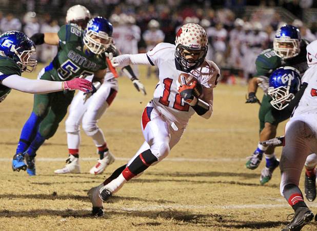 Coronado's Jackson Cofer runs the ball into the end zone for a touchdown against Green Valley during the Sunrise regional semifinal at Green Valley High School in Henderson Friday, November 16 , 2012.