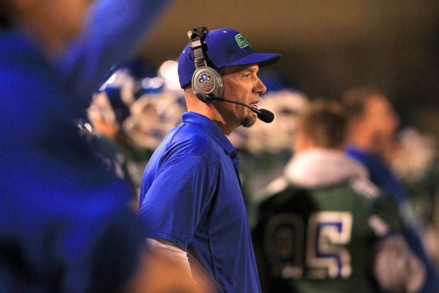 Green Valley coach Brian Castro watches his players take on Coronado during the Sunrise regional semifinal at Green Valley High School in Henderson Friday, November 16 , 2012.