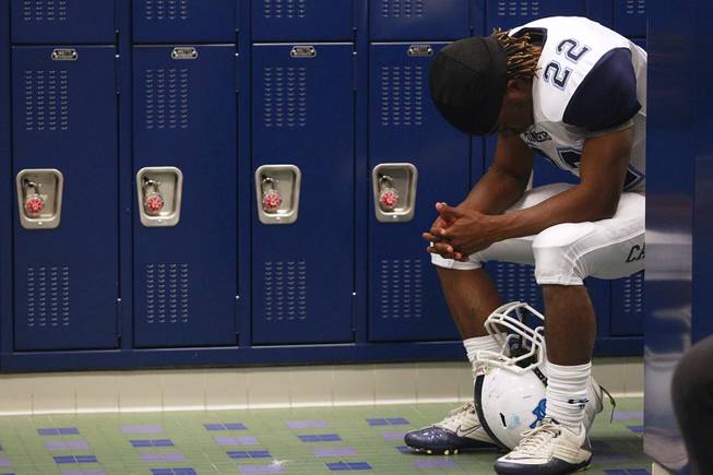 Canyon Springs defensive back Stephon Revels Jr. collects his thoughts before their playoff game against Liberty.