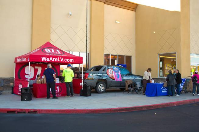 HELP of Southern Nevada; with the help of 97.1 The Point and 8 News NOW; collects turkey donations for their charity Thanksgiving baskets; Friday; Nov. 16; 2012.